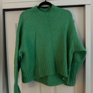 COS green sweater